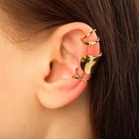 Earrings "Cuffs", set of 3 pieces, one large, gold color