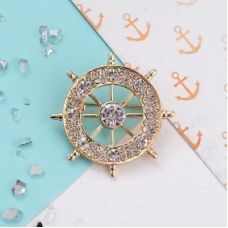 Brooch "Steering wheel", white in gold