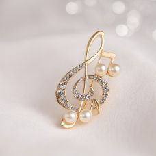 Mirvari notlarıyla "Skripka açarı" broşkası